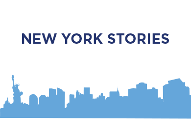 A blue silhouette of the New York City skyline