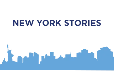 A blue silhouette of the New York City skyline